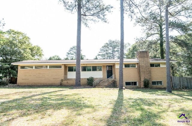 view of front of house with a front lawn