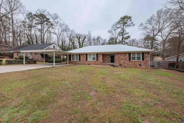 single story home with a front lawn and a carport