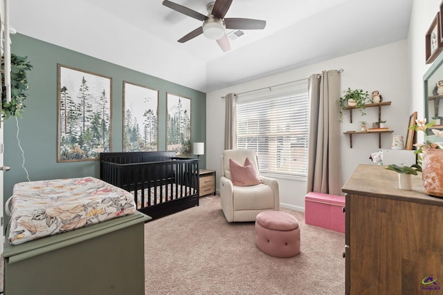 bedroom featuring ceiling fan, light colored carpet, and vaulted ceiling