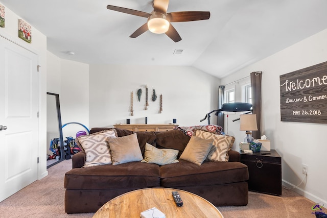 living room with light carpet, vaulted ceiling, and ceiling fan