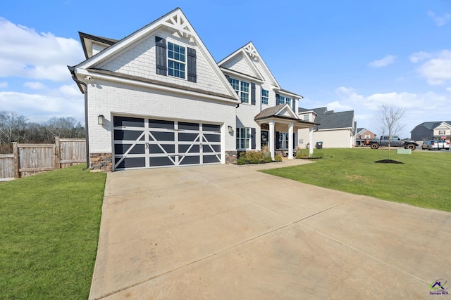 view of front facade featuring a garage and a front yard