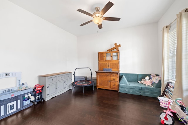 game room featuring ceiling fan and dark hardwood / wood-style flooring