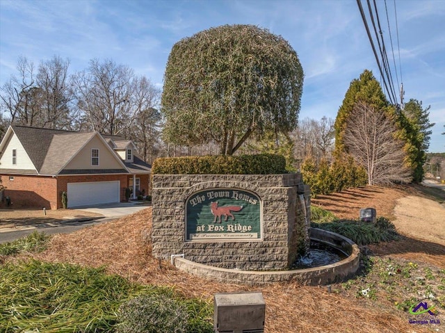 view of community sign