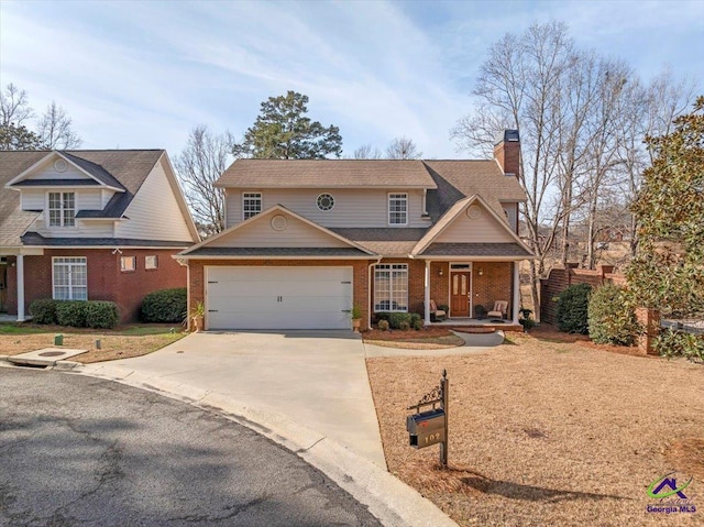 view of front of house featuring a garage and covered porch