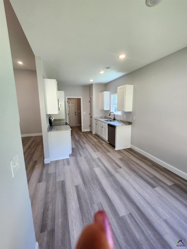111 Silver Maple, Byron, GA 31008 - kitchen with a sink, baseboards, white cabinets, and dishwasher