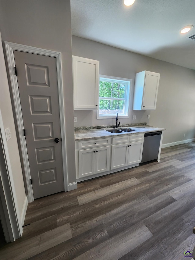 111 Silver Maple, Byron, GA 31008 - kitchen with a sink, white cabinets, stainless steel dishwasher, light countertops, and recessed lighting