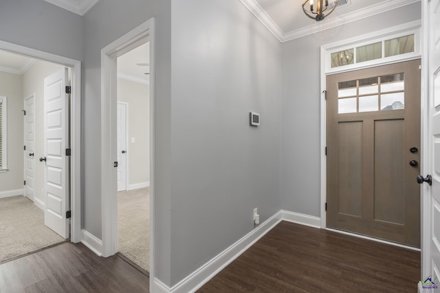 entryway featuring crown molding and dark hardwood / wood-style flooring