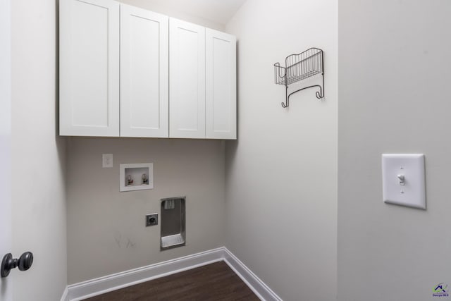 washroom with dark wood-type flooring, cabinets, hookup for an electric dryer, and hookup for a washing machine