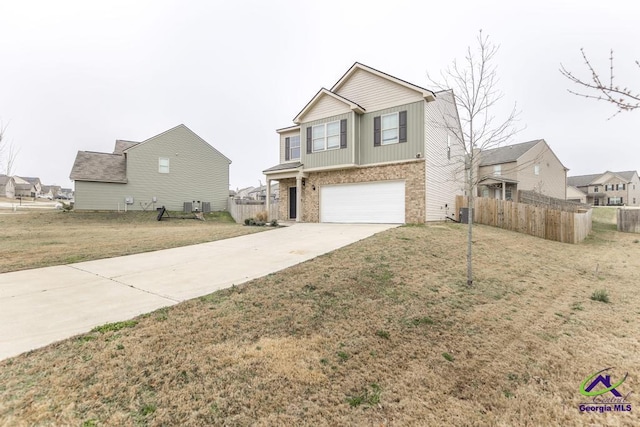 view of front facade featuring a front lawn and a garage