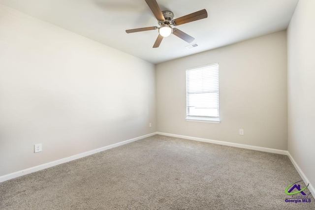 carpeted empty room with ceiling fan