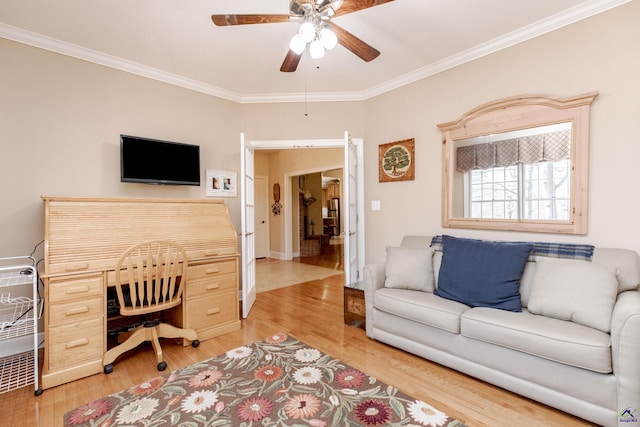 office featuring hardwood / wood-style floors, ornamental molding, and ceiling fan