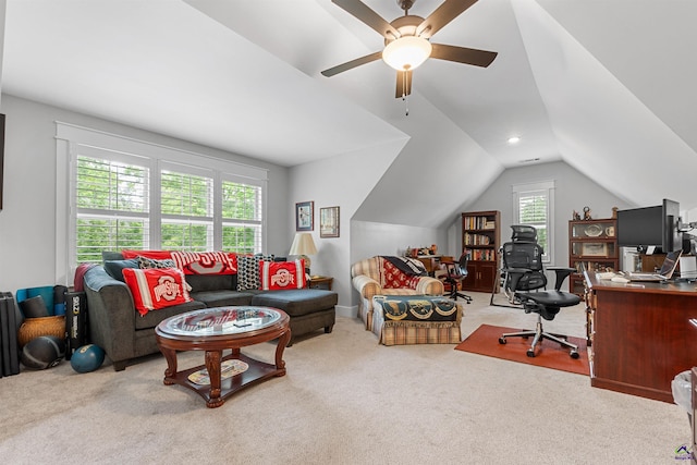 office space featuring ceiling fan, lofted ceiling, and carpet