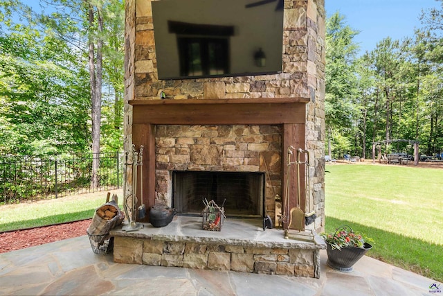 exterior details with an outdoor stone fireplace