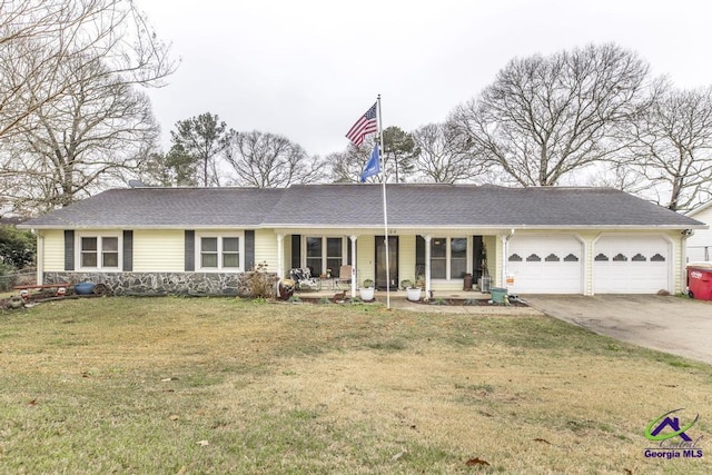 ranch-style home featuring a garage, a front lawn, and a porch