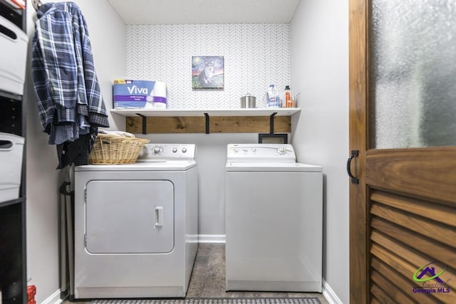 laundry area with separate washer and dryer