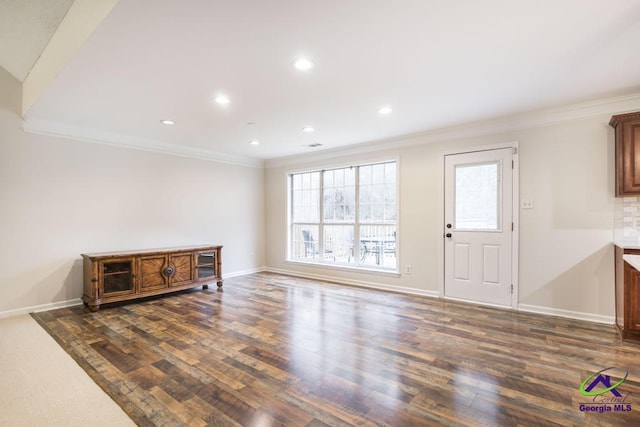 living room with ornamental molding and dark hardwood / wood-style floors