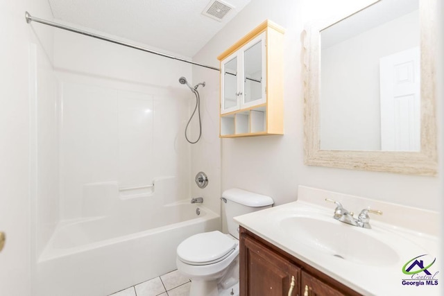 full bathroom featuring vanity, tile patterned flooring, toilet, and shower / bath combination