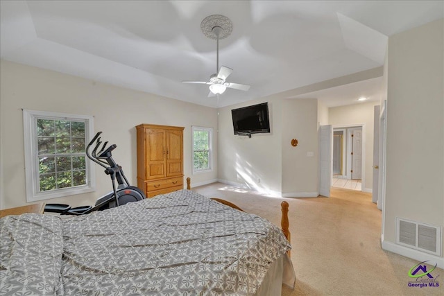 carpeted bedroom with ceiling fan