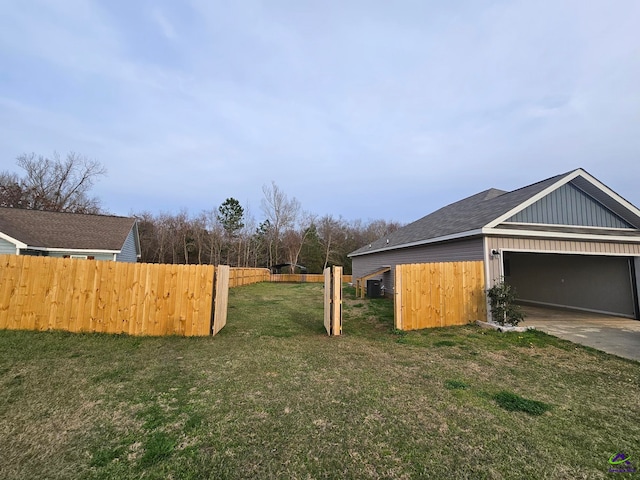 view of yard with a garage