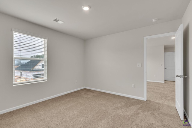 view of carpeted spare room