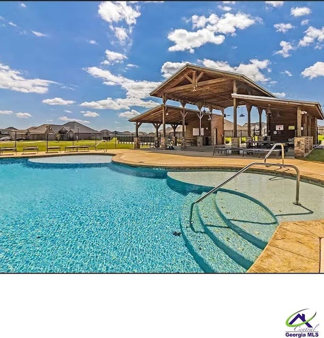 view of pool with a patio area