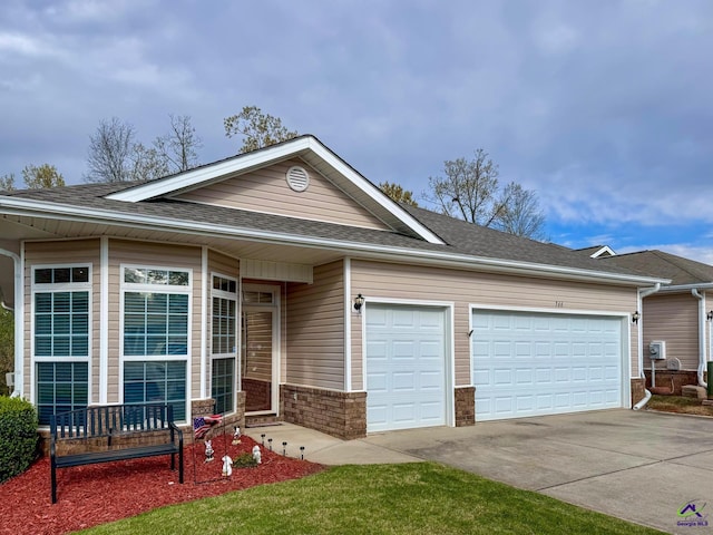 ranch-style home with a garage