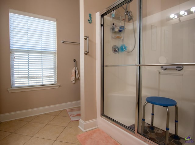 bathroom featuring tile patterned flooring and walk in shower