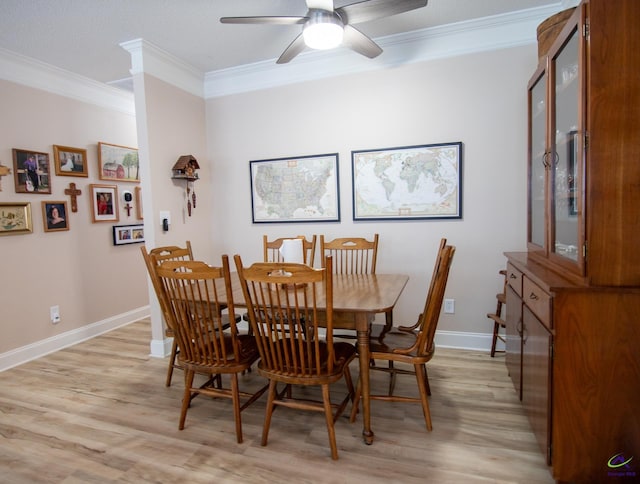 dining space featuring crown molding, ceiling fan, and light hardwood / wood-style floors