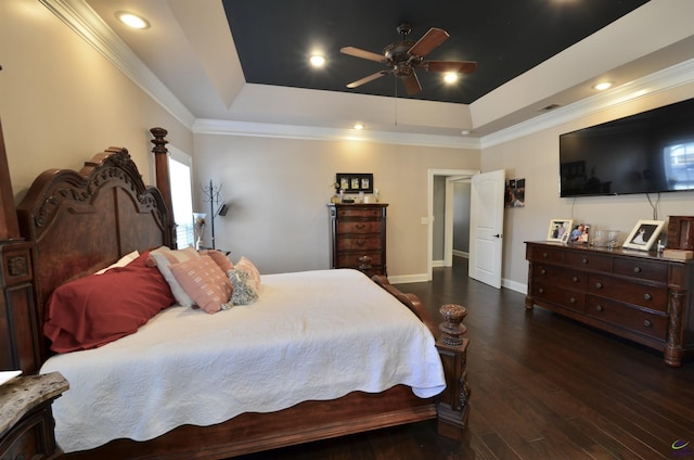 bedroom featuring a raised ceiling, ornamental molding, ceiling fan, and dark hardwood / wood-style flooring