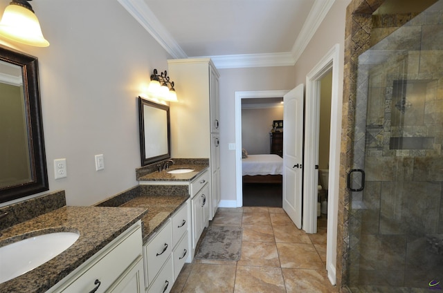 bathroom featuring crown molding, vanity, a shower with shower door, tile patterned floors, and toilet