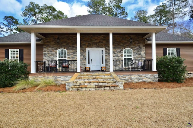 view of front facade featuring covered porch