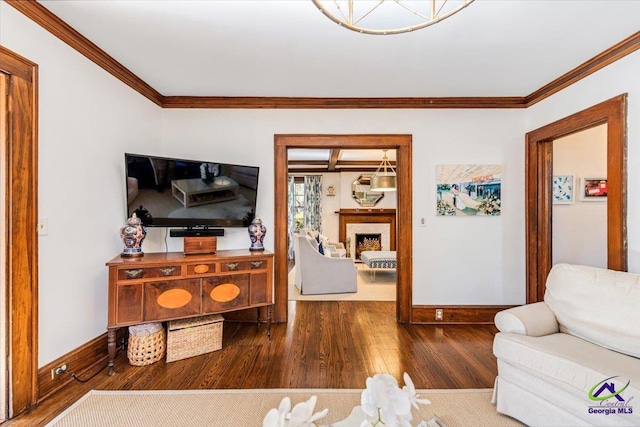 living room featuring ornamental molding and hardwood / wood-style floors