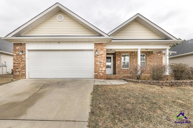 view of front of property featuring a garage