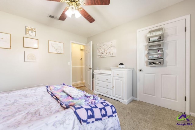 carpeted bedroom with ceiling fan