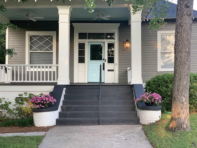 entrance to property with ceiling fan