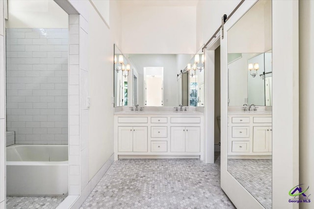 bathroom featuring vanity and a chandelier