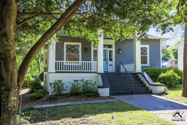 view of front of house with covered porch