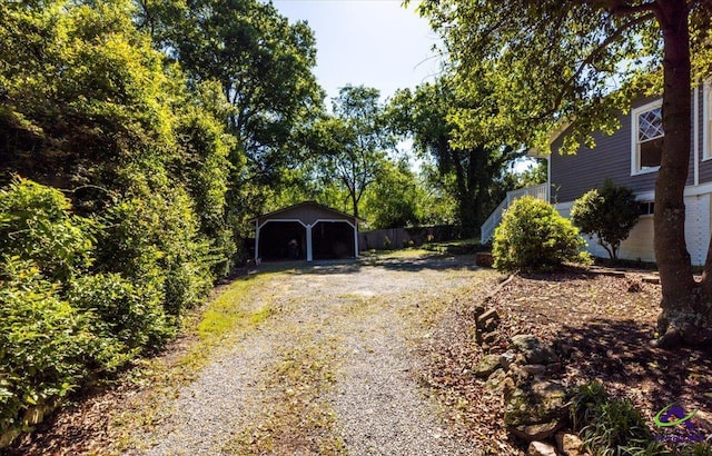 view of yard with an outdoor structure