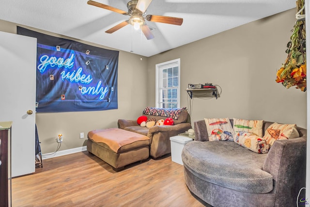 interior space featuring hardwood / wood-style flooring and ceiling fan