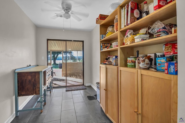 doorway to outside with ceiling fan