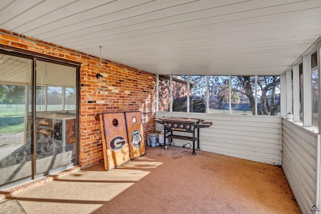 sunroom featuring a healthy amount of sunlight