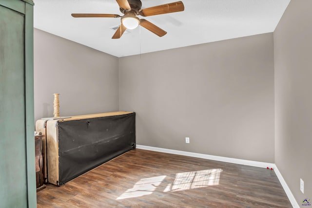 unfurnished room featuring hardwood / wood-style flooring and ceiling fan