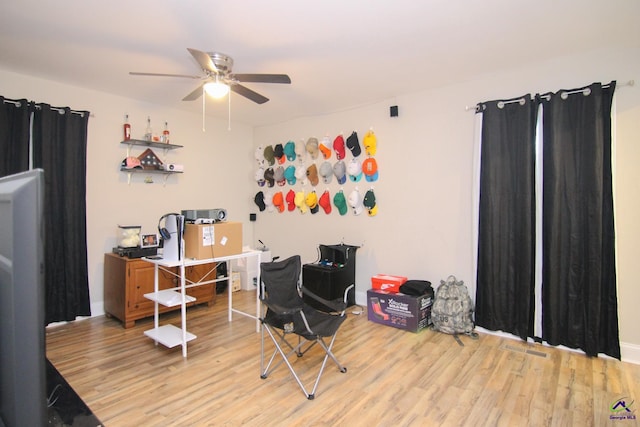 office featuring ceiling fan and light hardwood / wood-style floors