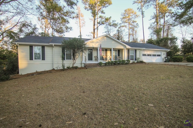 single story home featuring a front lawn, a garage, and a porch