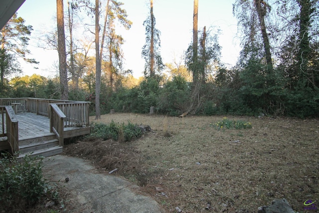 view of yard with a wooden deck