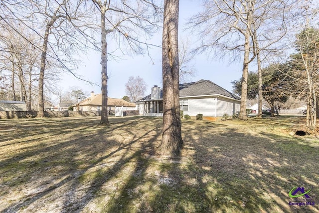 single story home featuring a front yard