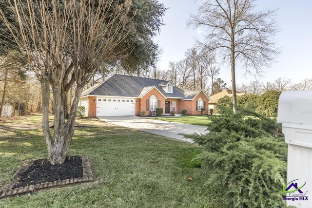 view of front facade with a garage and a front lawn