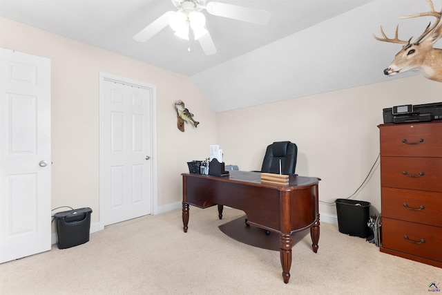 carpeted office featuring vaulted ceiling and ceiling fan