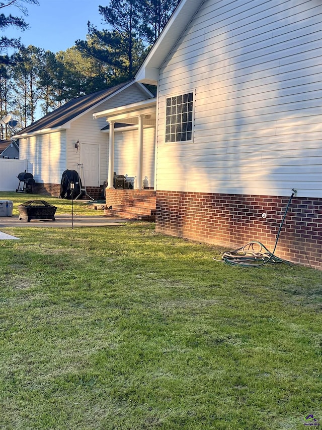 view of home's exterior featuring a lawn