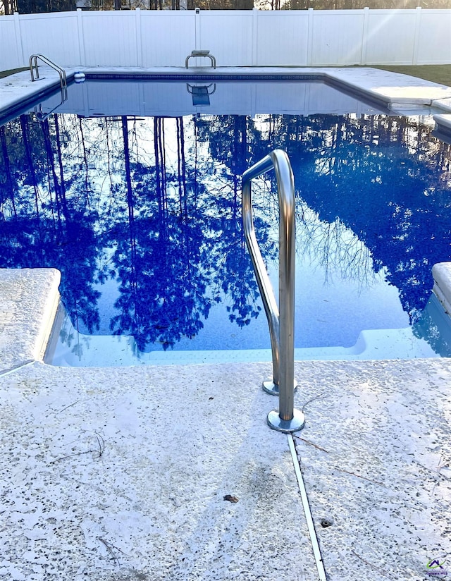 view of pool featuring fence and a fenced in pool